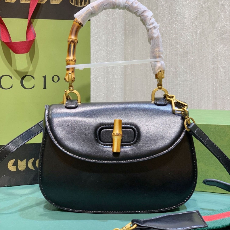 G*u*i top handle bags